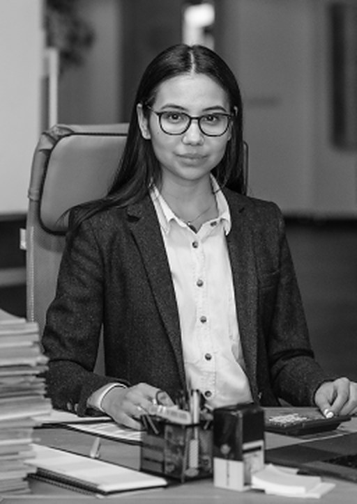 Marisa Vaughn at her desk reviewing case paperwork